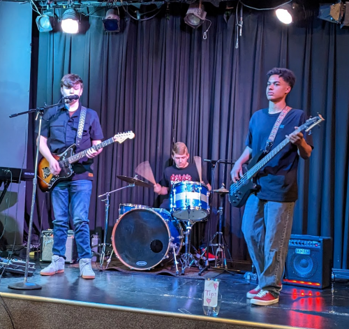 Tuesday Rock Band performing at Westport Coffee House